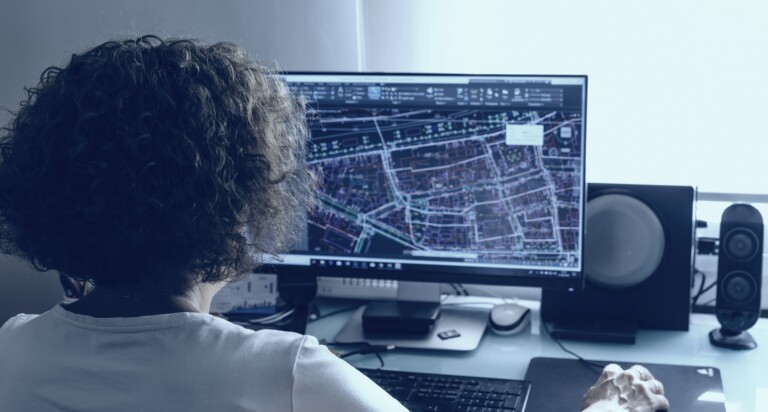 Architect drawing with cad software designing building