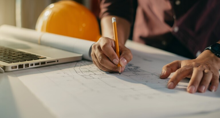Architect construction engineer plan on hard project at work.